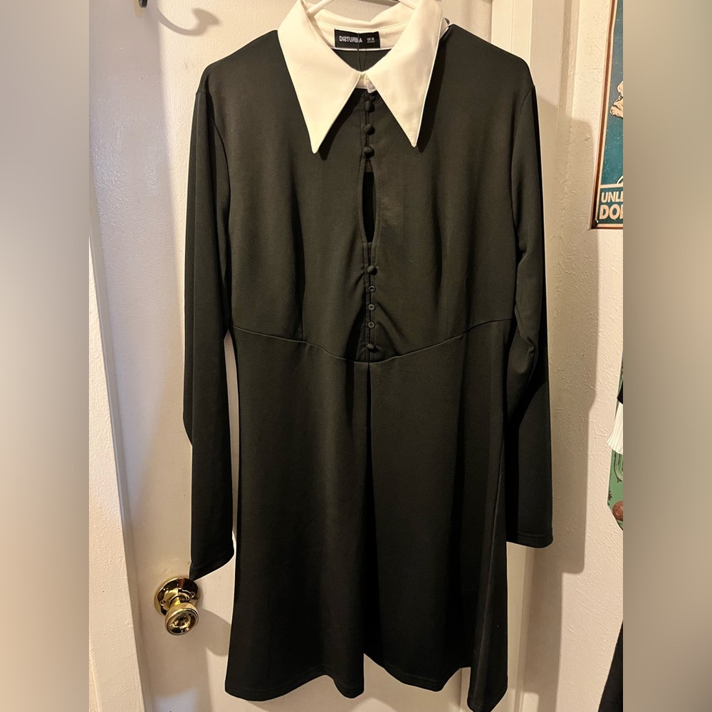 Disturbia- size UK16- black l/s dress w/white collar, buttons, bust slit. NWT.